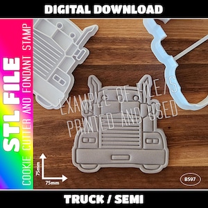 May include: A white plastic cookie cutter in the shape of a semi-truck. The cutter is 75 mm wide and is shown on a wooden surface. The text "TRUCK/SEMI" is printed below the cutter.