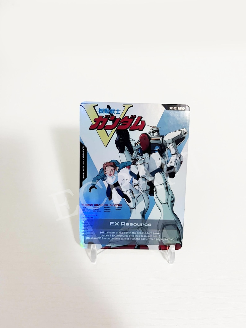 May include: A trading card featuring a white and blue robot with red accents, and a person in a blue jacket. The card has Japanese text and the words "EX Resource". The background is white.