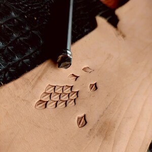 3D dragon scale pattern embossed on vegetable-tanned leather