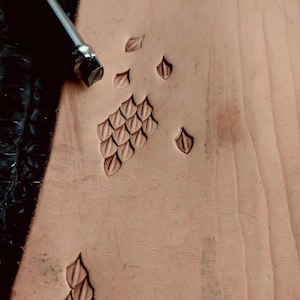 3D dragon scale pattern embossed on vegetable-tanned leather