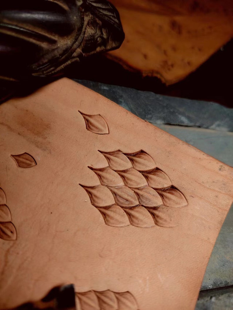 Reptile texture leather embossing result on brown leather