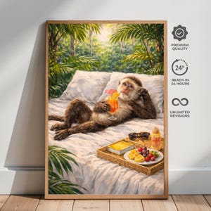 May include: A framed print depicts a monkey lounging on a bed, holding a cocktail with an umbrella. A tray with fruit, a book, and sunglasses sits nearby. The background shows lush green foliage and a sunny sky. The print is framed in a light brown wooden frame.