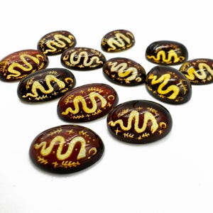 Natural Baltic Amber Snake Intaglio Cherry Color bottom, Regular  Calibrated Oval Shape 13x18 mm Flat Bottom Cabochon