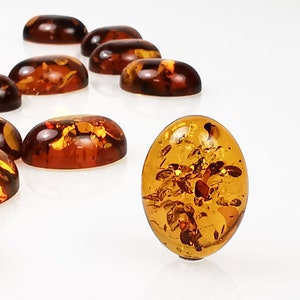 Natural Baltic Amber Cognac Color, Regular Calibrated Oval Shape 7x9 - 8x10 - 8x12 - 10x14 - 12x16 - 13x18 - 15x20 mm Flat Bottom Cabochon