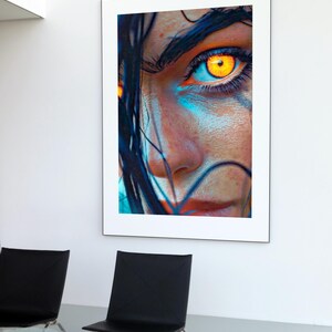 May include: Close-up of a woman's face with a bright yellow eye. The woman has dark hair and blue and white makeup on her face.