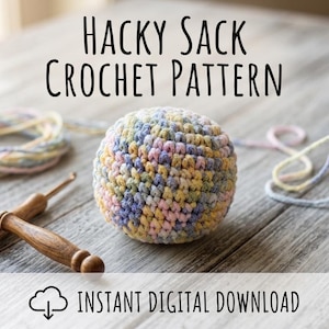 May include: A crochet pattern for a hacky sack featuring the text HACKY SACK CROCHET PATTERN, Easy to Follow, and INSTANT DIGITAL DOWNLOAD. The image displays a multicolored pastel yarn ball, a partially crocheted bowl, and two wooden crochet hooks.