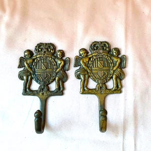 Antike Bronze Bronze Cherub Kleiderhaken: Klassisches Wappen, Anfang 1900er Jahre