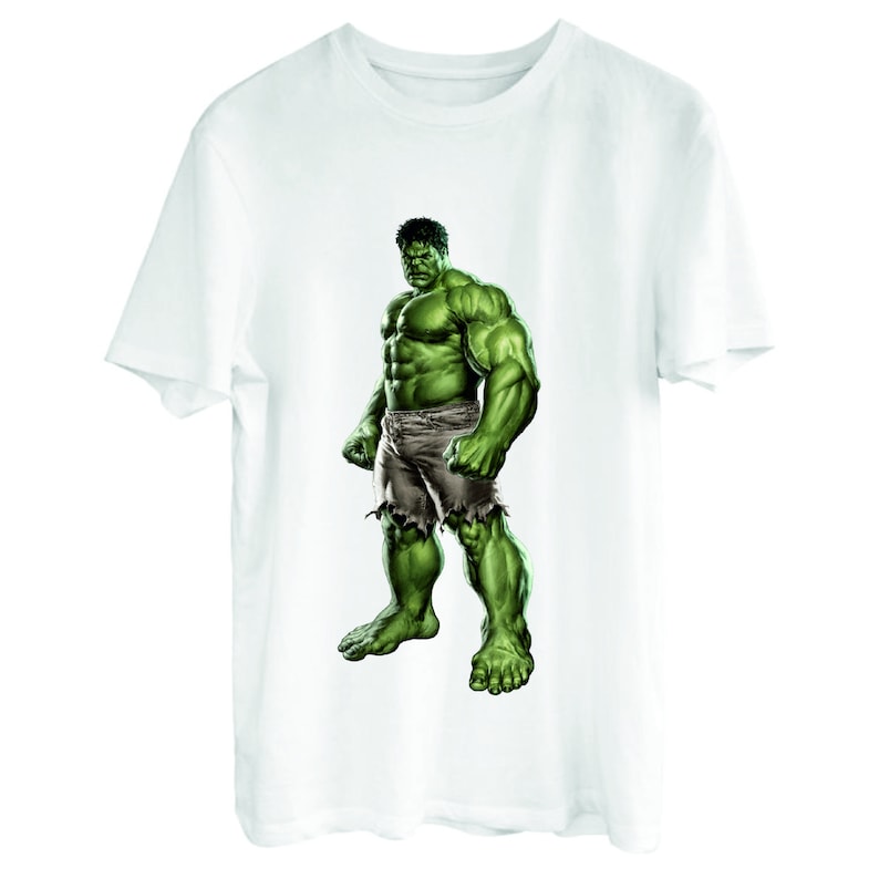 May include: White t-shirt with a green Hulk graphic print. The Hulk is depicted in a muscular pose with his fists clenched.