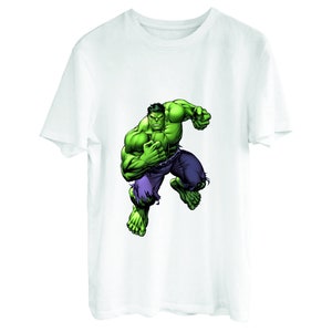 May include: White t-shirt with a green and purple graphic of the Hulk, a superhero, in a fighting pose.