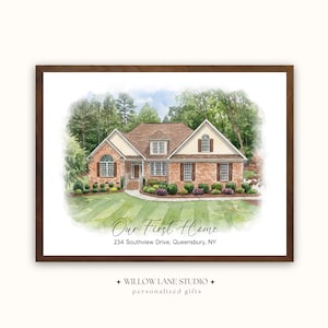 May include: Watercolor painting of a house with a brown frame. The house is brick with a brown roof and white trim. The text "Our First Home" and address are below the house. The bottom of the frame has the text "WILLOW LANE STUDIO + personalized gifts."