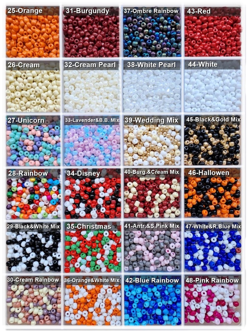 May include: A grid of twenty-four square compartments containing small, round, colorful beads. Each section is labeled with a number and a name, including colors like orange, burgundy, red, cream, white, black, and various multi-colored mixes.