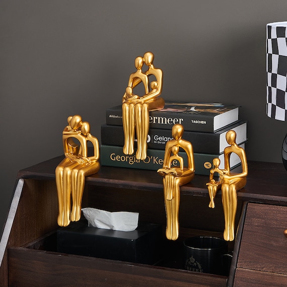 Ornamentos de estatuas para la casa moderna Figuras doradas Esculturas