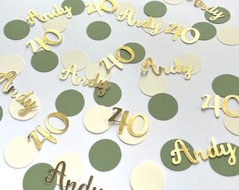 May include: Gold confetti with the name "Andy" and the number "40" on white and green circles.