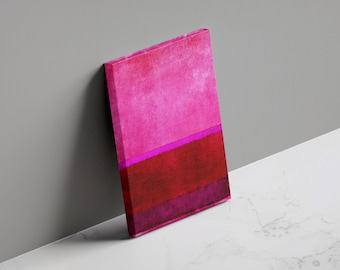 May include: A rectangular canvas art piece with a layered abstract design. The top section is a bright pink, followed by a thin magenta stripe, and a deep red-burgundy section at the bottom. The canvas is leaning against a gray wall.