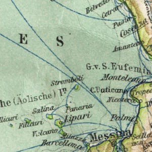 May include: A vintage map of Italy with the Aeolian Islands labeled in blue. The map shows the islands of Stromboli, Salina, Filicuri, Lipari, and Panaria. The text "he (Aolische) I" is visible on the map.
