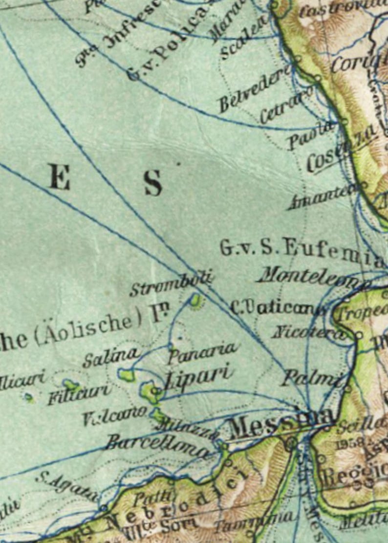 May include: A vintage map of Italy with the Aeolian Islands labeled in blue. The map shows the islands of Stromboli, Salina, Filicuri, Lipari, and Panaria. The text "he (Aolische) I" is visible on the map.