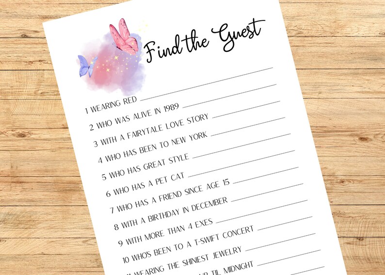 May include: A white paper with the text "Find the Guest" in cursive script. The top left corner features watercolor butterflies in pink and blue. The game includes fill-in-the-blank prompts such as "Wearing Red" and "Who Has a Pet Cat."