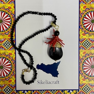 Necklace with onyx pendant, black crystal thread, authentic Trapani coral.