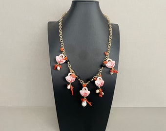 Sicilian necklace, Caltagirone necklace, hypoallergenic golden aluminum chain, ceramic handbags decorated with coral, baroque pearls and onyx.ç