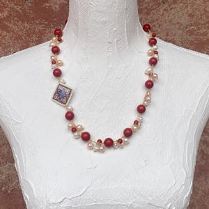 Handcrafted necklace with red Mallorca pearls and Caltagirone tiles - Elegant Sicilian-inspired jewelry