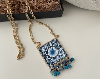 Necklaces with Caltagirone ceramic tile, golden hypoallergenic aluminum chain, various lengths.=