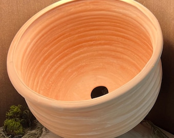 Maceta o jardinera redonda de terracota
