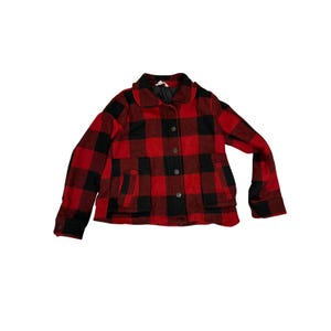 May include: A red and black buffalo plaid jacket with a collared neckline, button closure, and two front pockets. The jacket is made of a thick, warm material, perfect for cooler weather.