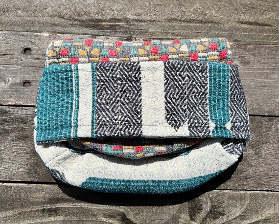 Boho Chic Clutch hand sewn with recycled upholstery fabric. Matches everything. Stylish, one of a kind, stand-out bag.