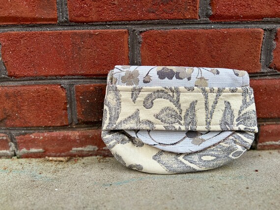 Boho Chic Clutch hand sewn with recycled upholstery fabric. Matches everything. Stylish, one of a kind, stand-out bag.