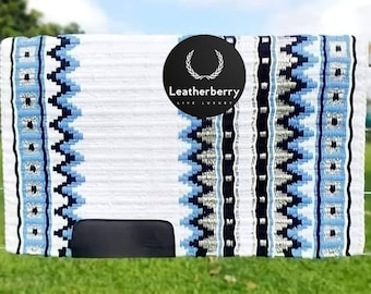 Light blue New zealand wool saddle pad for horse riding.