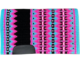 May include: A pink and turquoise saddle pad with a black geometric pattern. The saddle pad has a black leather girth strap.