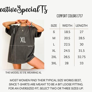 May include: Dark gray oversized t-shirt with the text "XL" on the front. The image includes a size chart with measurements in inches for width and length, and the text "Creative Special Ts" and "COMFORT COLORS 1717".