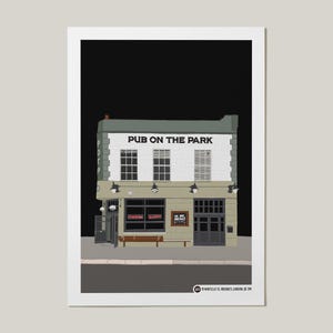 May include: A print featuring a detailed illustration of a pub named "PUB ON THE PARK". The building has a white and grey facade, with windows and a dark grey door. The image is set against a black background.