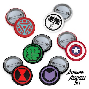 May include: Set of 6 round button badges featuring Marvel Avengers characters. The badges are black with a white background and feature the following characters: Iron Man, Thor, Hulk, Captain America, Black Widow, and Hawkeye. The text "Avengers Assemble Set" is printed below the badges.