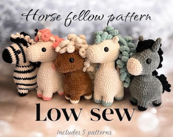 May include: Five crocheted stuffed animals, including a zebra, a horse, a brown horse, a white horse with blue yarn mane, and a gray donkey. The animals are all standing on a light brown surface. The text "Horse fellow pattern" and "Low sew" are written above the animals. The text "Includes 5 patterns" is written below the animals.