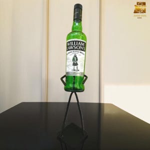 Porta botellas de hierro forjado