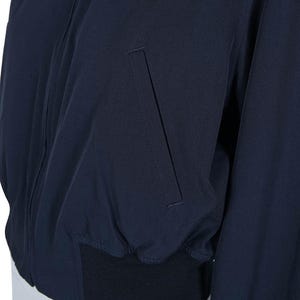 May include: A set of three ceramic mugs with a speckled, matte finish in cream, light grey, and dark grey. Each mug has a simple, modern design and a comfortable handle.