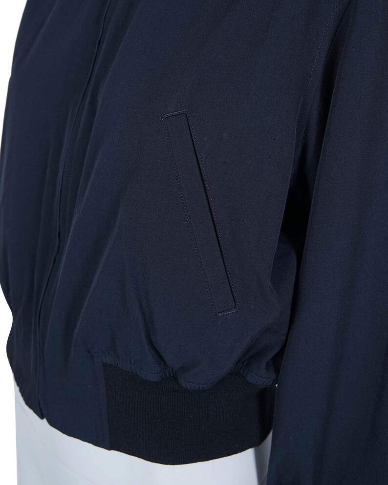 May include: A set of three ceramic mugs with a speckled, matte finish in cream, light grey, and dark grey. Each mug has a simple, modern design and a comfortable handle.