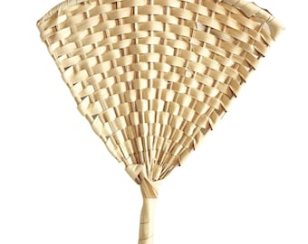 May include: A woven fan made of natural materials, with a light brown color and a fan shape. The fan is made of thin strips of material that are woven together to create a delicate and intricate design.