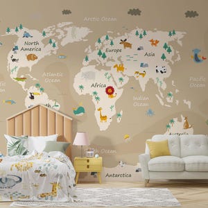 May include: A beige world map mural with illustrated animals and continents. The map is decorated with cartoon animals, trees, and ocean names. A bed, sofa, and side table are in front of the mural.
