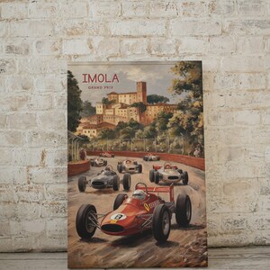 May include: Vintage poster featuring a red Ferrari race car on a track with a cityscape in the background. The poster reads "IMOLA GRAND PRIX".