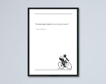 May include: Black and white framed print featuring a cyclist illustration. The print includes the quote "It never gets easier, you just get faster." by Greg LeMond. The artwork is minimalist and suitable for home or office decor.