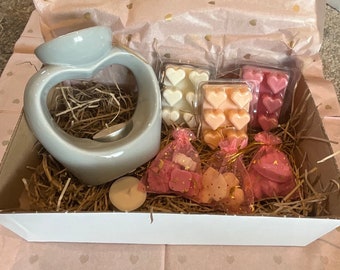 Gift box with   grey  heart burner and melts