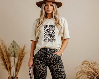 We Ride At Dawn Graphic T In Cream or Black