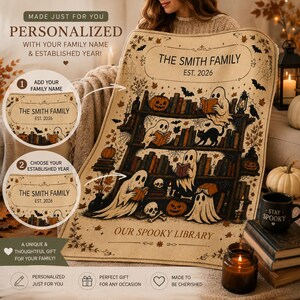 May include: A beige fleece blanket featuring a Halloween-themed illustration of ghosts reading books on a wooden bookshelf, decorated with pumpkins, bats, and spiderwebs. The text reads THE SMITH FAMILY, EST. 2026, and OUR SPOOKY LIBRARY.