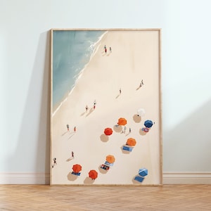 May include: An aerial view of a beach with people and colourful umbrellas. The beach is sandy and the water is blue. The umbrellas are red, orange, and blue.
