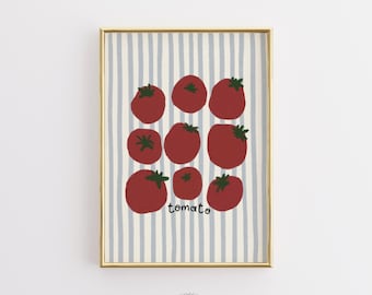 May include: A framed print showing nine red tomatoes with green stems on a striped background of light blue and white. The word "tomato" is written in a handwritten font below the tomatoes. The frame is gold.