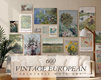 May include: A collection of 600 vintage European printable wall art prints displayed in a living room setting. The prints feature a variety of styles and subjects, including landscapes, floral arrangements, and abstract designs. The prints are arranged on a wall in a grid pattern, and they are surrounded by a white sofa, a wooden coffee table, and a potted plant.