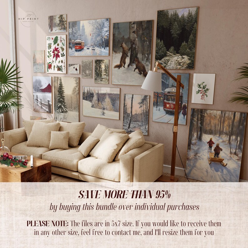 May include: A collage of 12 winter-themed paintings, including snowy landscapes, a red trolley, and a group of foxes. The paintings are arranged on a wall in a living room setting with a beige sofa and a floor lamp.
