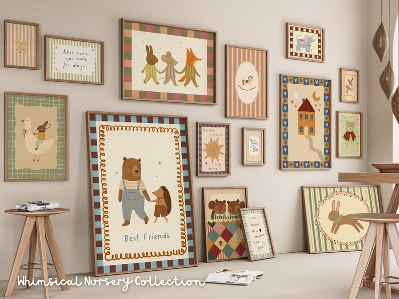 May include: A collection of framed art prints with whimsical illustrations, including animals, houses, and inspirational quotes. The color palette features soft pastels and earth tones, creating a cozy nursery theme. The text "Best Friends" is visible on one print.